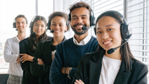 Experience the power of fast food business lead generation with a group of people standing next to each other wearing headsets, ready to capture every opportunity for your business.